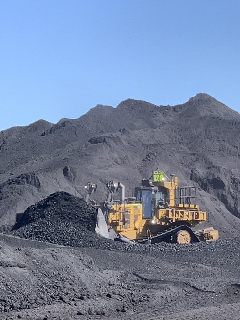 Dozer Stockpiler machinery operating at Coal Mine