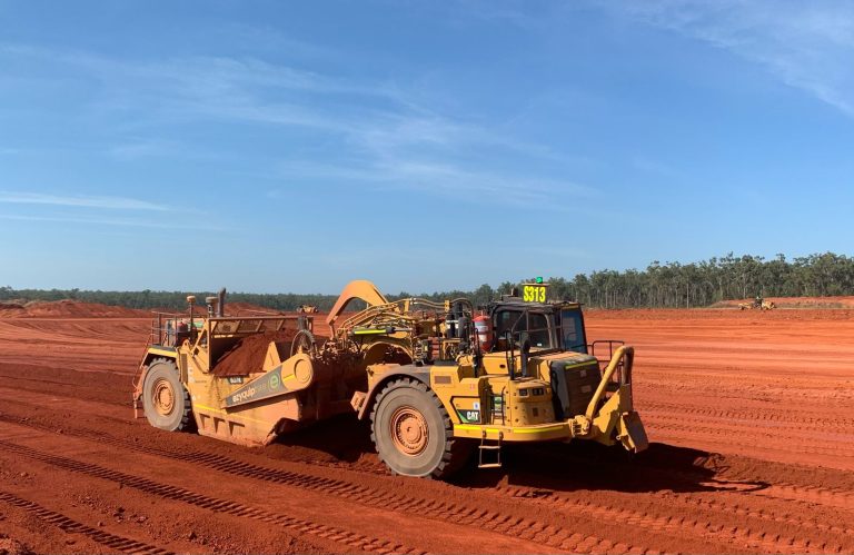 637K Scraper in operation on Australian red dirt